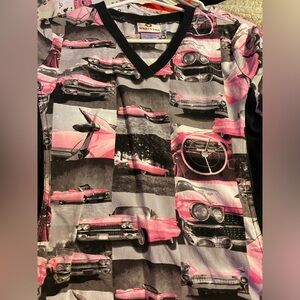 Women’s scrub top, size small but fits like XS